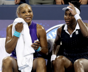 Serena and Venus Williams looking miserable when they lost in the first round of the recent Cincinnati Open.